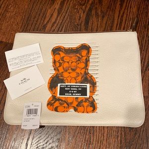 Brand new Coach gummy bear clutch